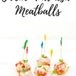 Prepared chicken parmesan meatballs on a white plate with toothpicks for easy appetizer eating Pinterest image