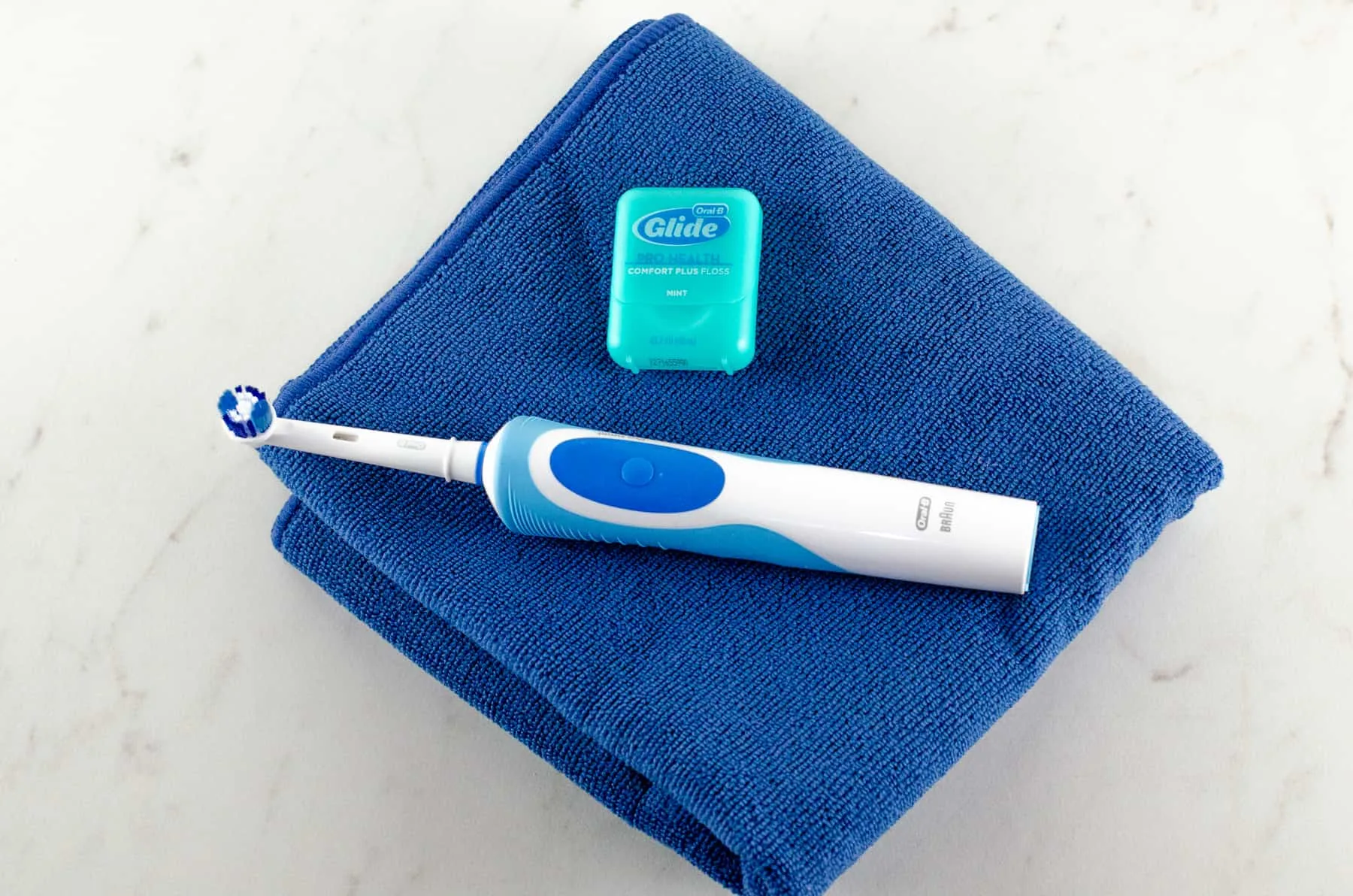 5+ Tips For Beautiful Healthy Smiles photo of toothbrush and floss