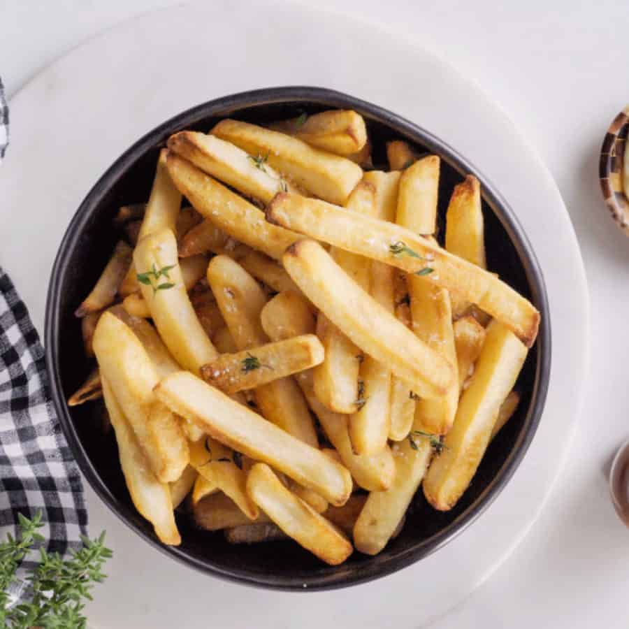 a bowl of crispy french fries cooked by the Breville Combi Wave 3-in-1 Microwave