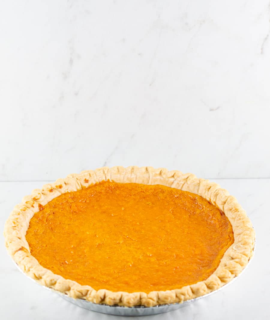The Best Sweet Potato Pie Recipe frontal photo of baked pie ready to serve