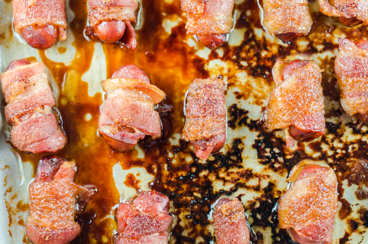 https://smartsavvyliving.com/wp-content/uploads/2021/08/bacon-wrapped-little-smokies-parchment-overhead.jpg