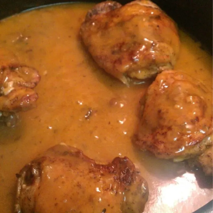 Chicken thighs prepared with Campbell's Chicken Marsala sauce in a skillet