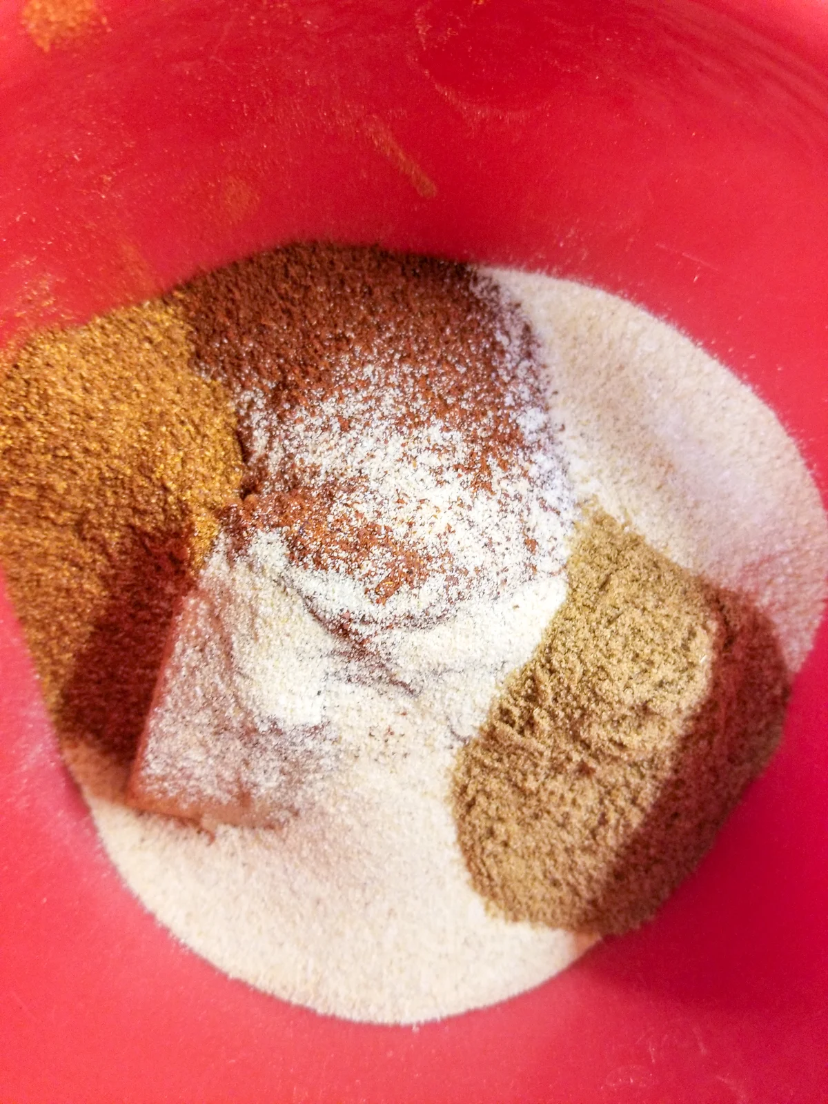 pork dry rub ingredients in a mixing bowl